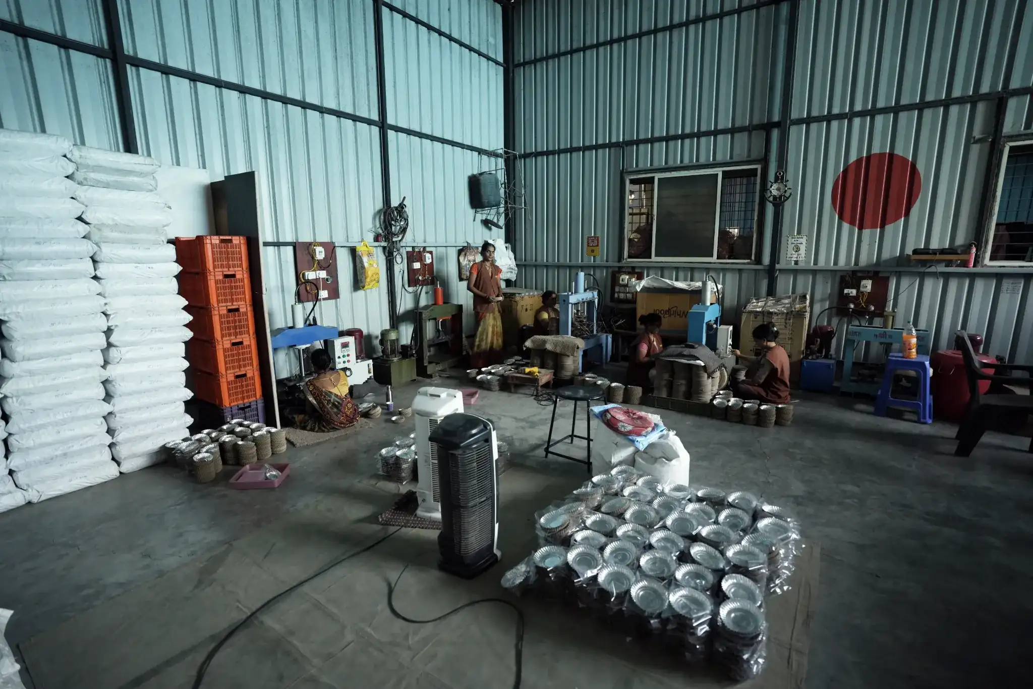 Workers at Machine